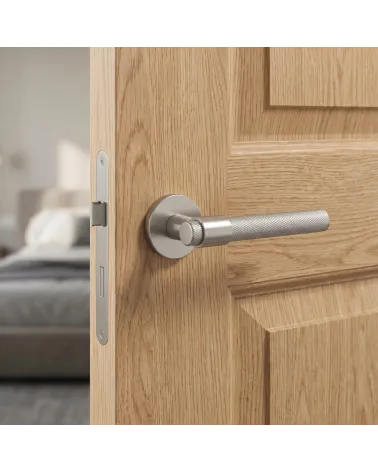 GOYA door handle on round rose