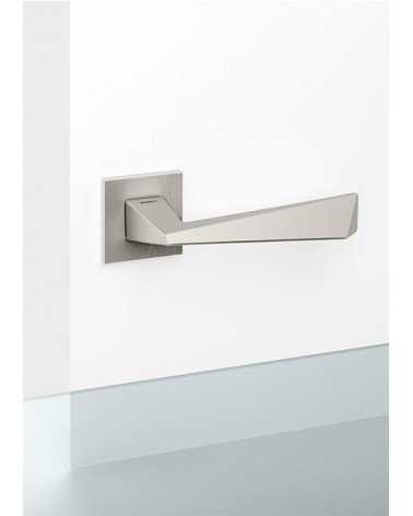 Satin nickel Mandelli Piramid door handle design handle mounted on a door