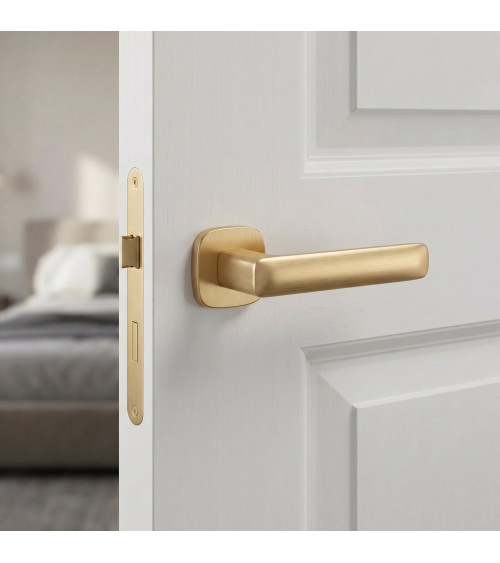 STELLA matt gold door handle design ironmongery