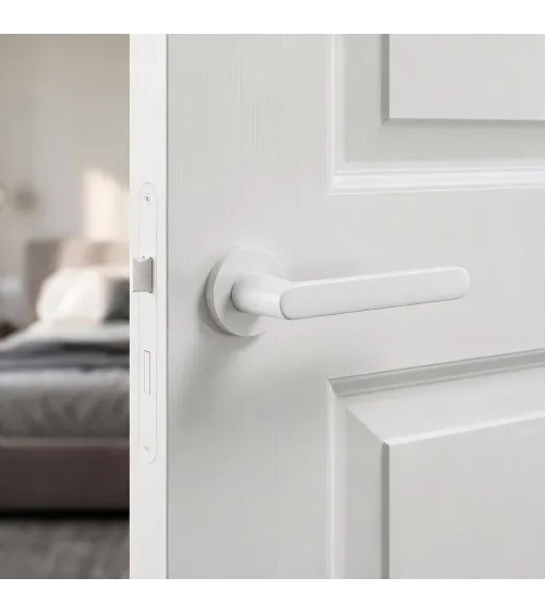 Nesh white door handle designer ironmongery