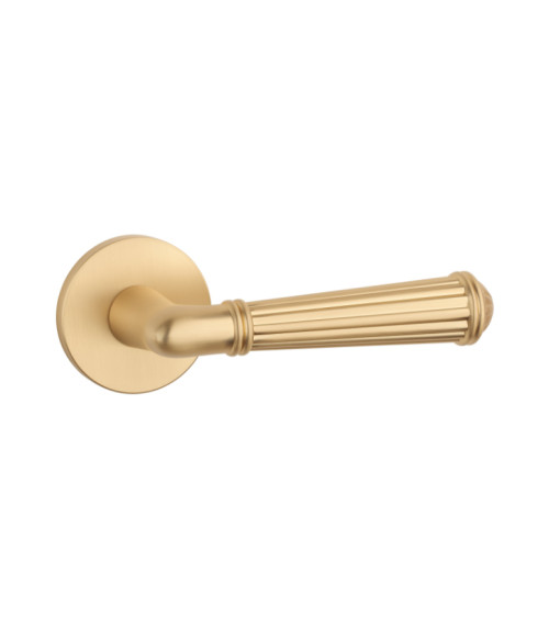 STILE ARIDA door handle in matt gold aluminium