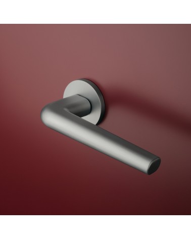 Satin chrome FUNKIA door handle designer handle mounted on a door