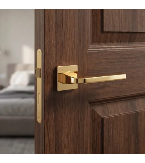 Polished brass ISMENA door handle designer handle
