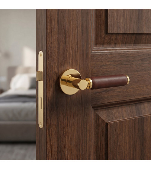 TUPAI 4200/201 round polished gold door handle with dark leather - designer handle