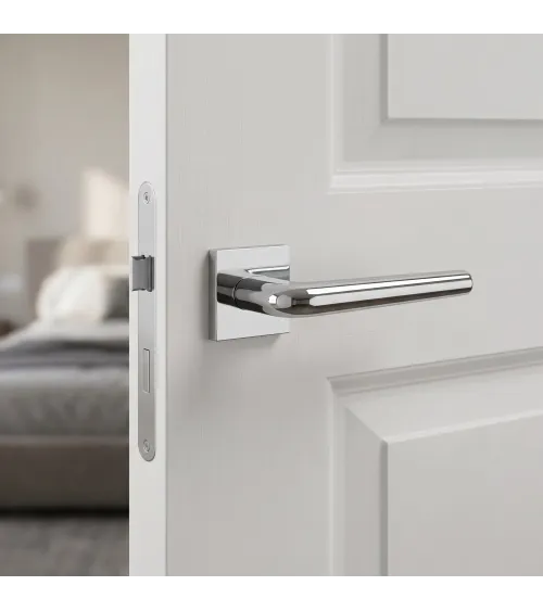 Polished chrome door handle on square plate FUNKIA - designer handle