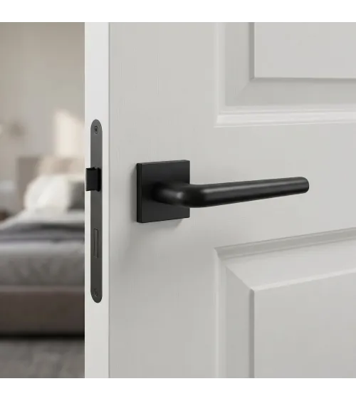 Polished chrome door handle on square plate FUNKIA - designer handle