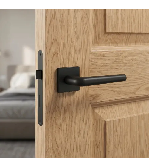 Polished chrome door handle on square plate FUNKIA - designer handle