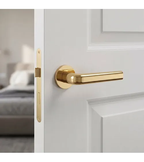 Polished gold INULLA door handle design handle