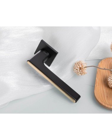 Black and Gold Two-Tone Door Handle on a square plate - Ferrara model - designer handle