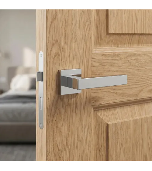 Satin chrome PINA door handle design handle