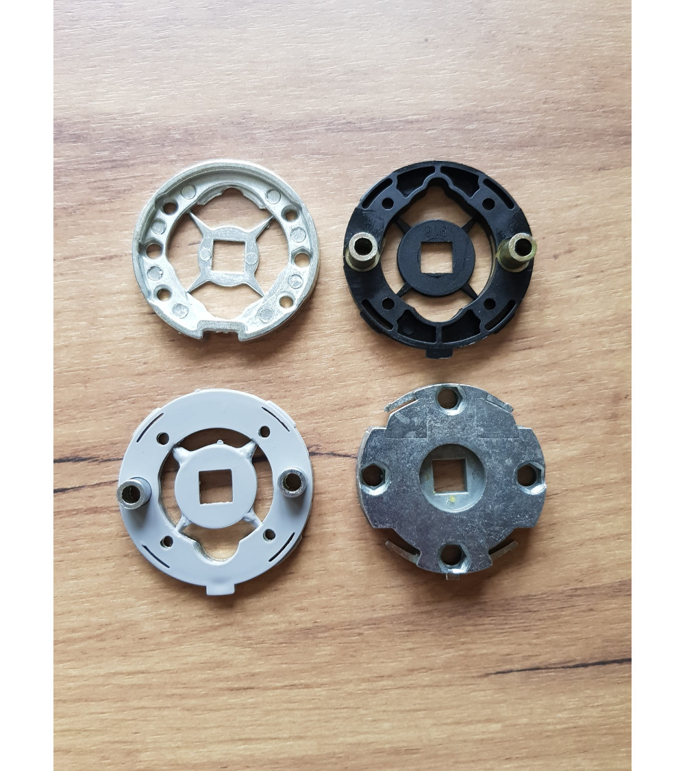 Four mounting adapters for door handles