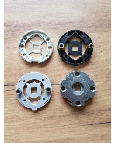 Four mounting adapters for door handles
