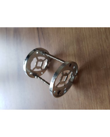 Two metal mounting adapters for door handles viewed from the side, with M4 through bolts