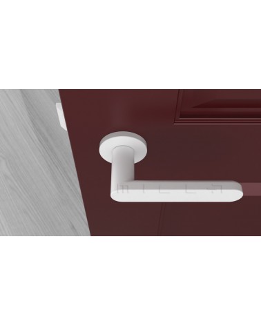 ALORA white design door handle top view mounted on a door