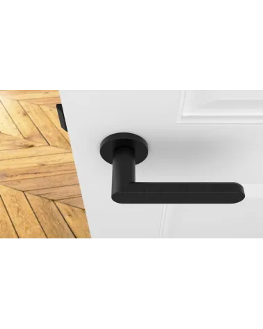 Black ALORA door handle designer handle top view mounted on a door