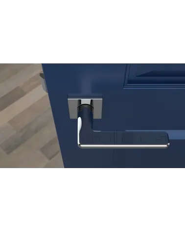 Contemporary SETIA designer door handle top view mounted on a door