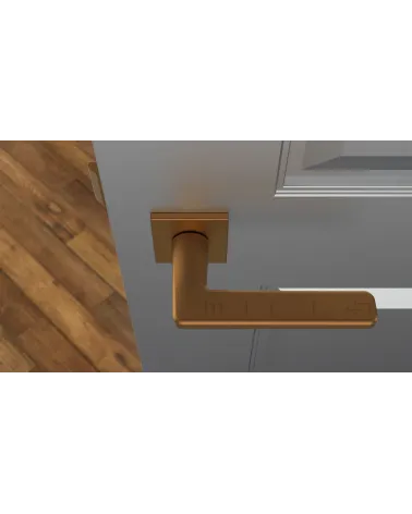 Copper SETIA door handle designer handle top view mounted on a door