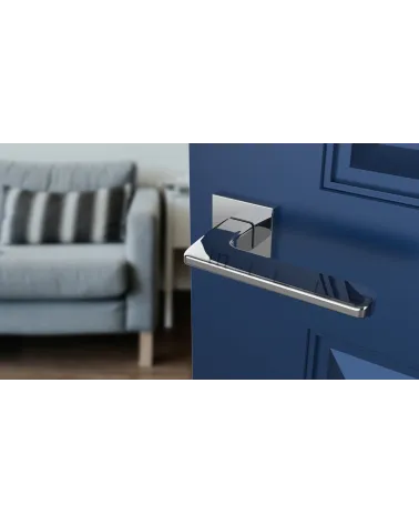 YUKA modern style door handle designer handle angled top view mounted on a door