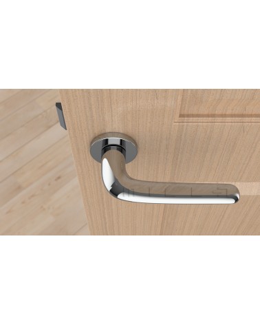 AZALIA polished chrome door handle designer handle top view mounted on a door