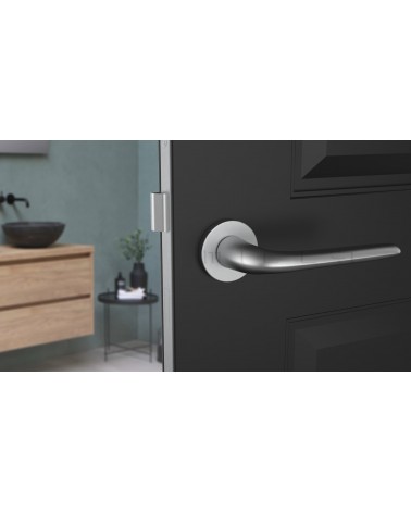 Satin Chrome AZALIA door handle designer handle front view mounted on a door