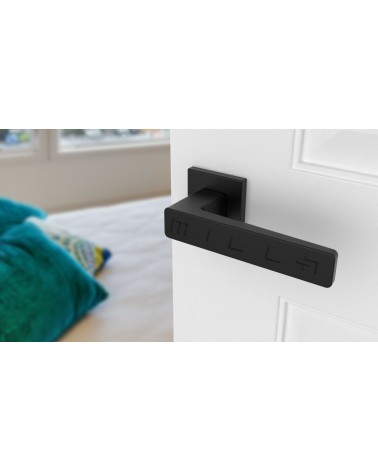 Classic ERICA door handle design hardware angled top view mounted on a door