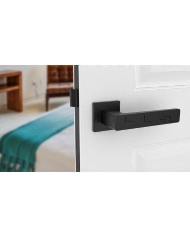 Classic ERICA door handle design hardware front view mounted on a door