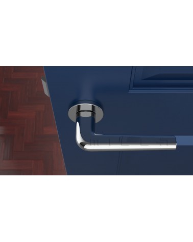 Polished chrome FUNKIA design door handle top view mounted on a door