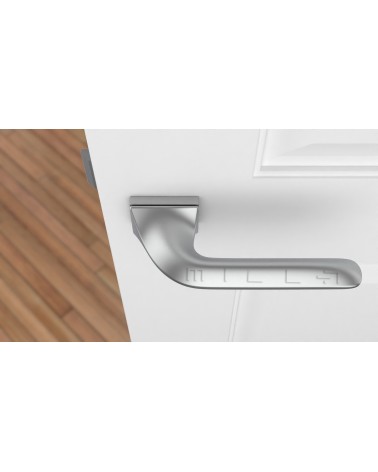 Satin chrome GLADIOLA door handle design handle top view mounted on a door