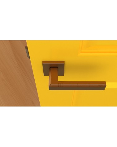RAFLESIA modern door handle design handle colour 1 mounted on a yellow door