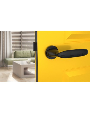 Black PEONIA design door handle front view mounted on a door