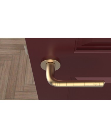 Matte Gold TULIPA interior door handle design top view mounted on a door