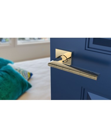 Modern JASMINA door handle design handle angled top view mounted on a door