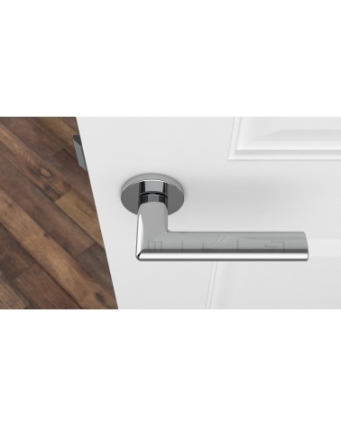 Polished chrome KALMIA door handle design handle top view mounted on a door