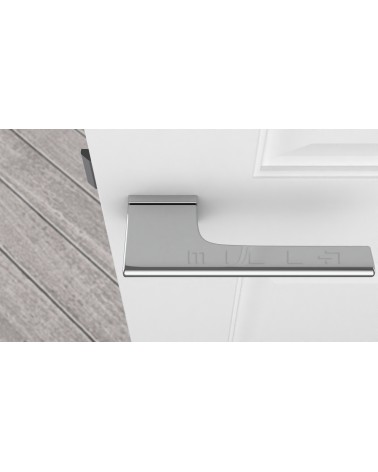 Polished chrome LUPINA door handle design handle top view mounted on a door
