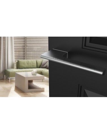 Satin chrome LUPINA door handle design handle angled view mounted on a door