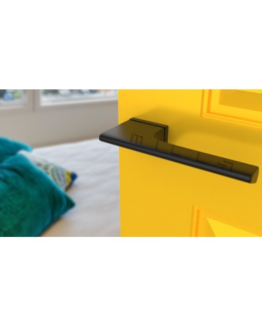 LUPINA black door handle designer handle angled view mounted on a door