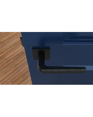 MELA black door handle designer handle top view mounted on a door