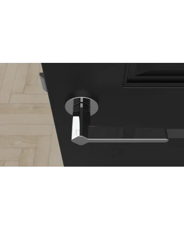 Futuristic style NINFEA door handle design hardware top view mounted on a door