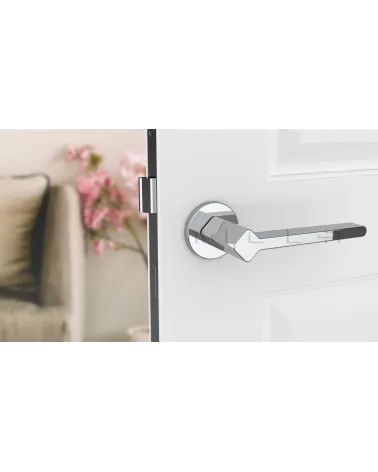 Futuristic style NINFEA door handle design hardware front view mounted on a door
