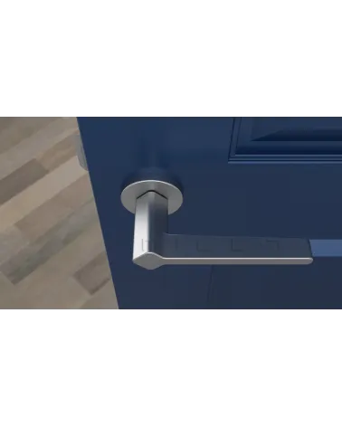 Satin chrome NINFEA door handle design handle top view mounted on a door 2