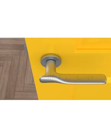 Satin chrome ORCHIDE door handle designer handle top view mounted on a door