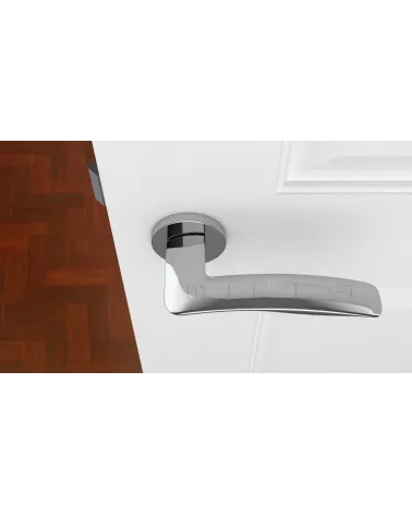 Polished Chrome ROBINE Door Handle Design Hardware Top View Mounted on a Door
