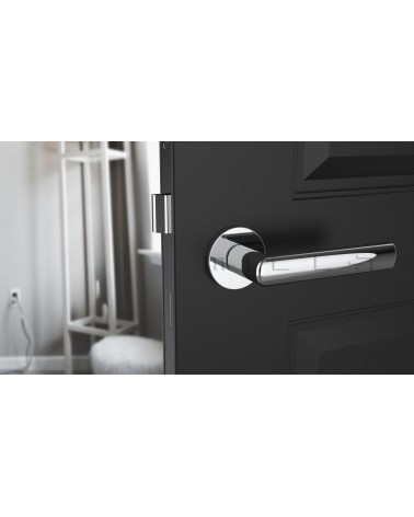 SILENA polished chrome door handle designer hardware front view mounted on a door