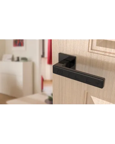 Classic TILLIA door handle design handle colour 1 angled top view mounted on a door