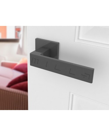 Titanium Apollo design door handle angled view mounted on a door