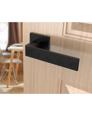Black Apollo design door handle angled view mounted on a door