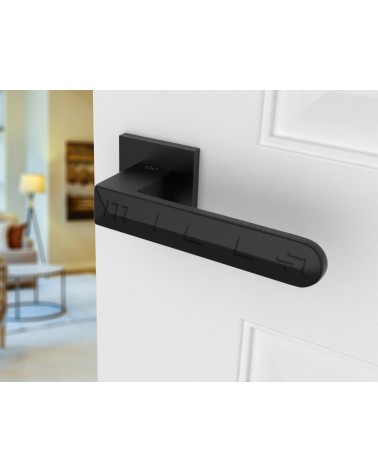 Black Bohema door handles on a white door side view