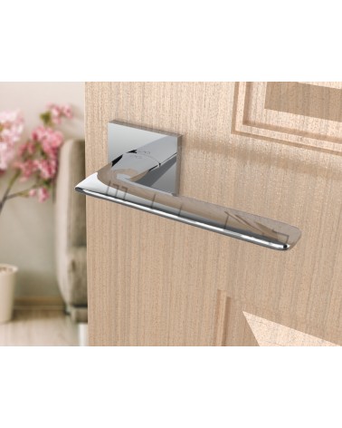 Line GIULIA design door handle colour 1 angled top view mounted on a door