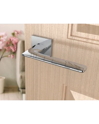 Line GIULIA design door handle colour 1 angled top view mounted on a door