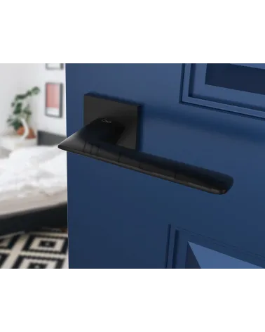 Zamak door handle Line GIULIA design handle design handle top angled view mounted on a door